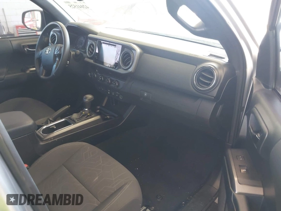 2018 Toyota Tacoma SR with VIN 3TMCZ5ANXJM146284, listed as a IAAI auction lot 42041525 with 103,143 mi miles and . Bid and sale history available at DreamBid. Image 5.