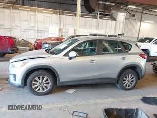 2016 Mazda CX-5 Sport with VIN JM3KE2BE5G0720507, listed as a IAAI auction lot 41872003 with 160,727 mi miles and . Bid and sale history available at carsss.com. Image 14.