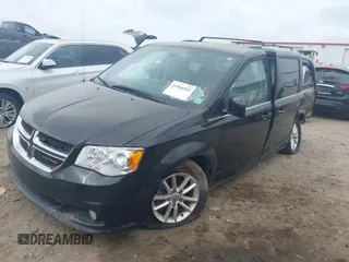 2018 Dodge Grand Caravan SXT with VIN 2C4RDGCGXJR283091, listed as a IAAI auction lot 41966553 with 102,309 mi miles and . Bid and sale history available at DreamBid. Image 17.
