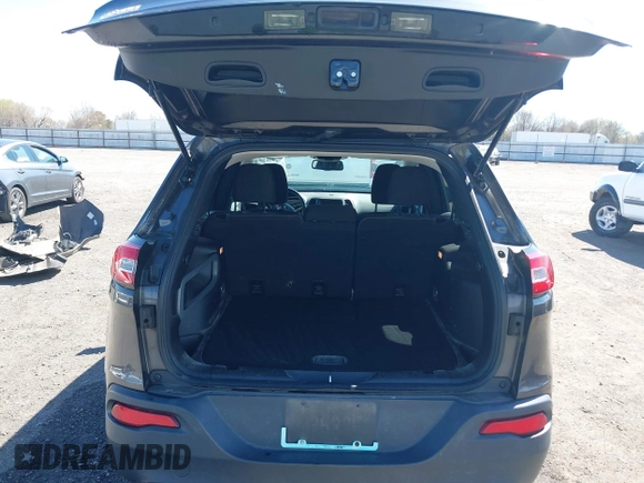 2017 Jeep Cherokee Latitude with VIN 1C4PJLCBXHW572714, listed as a IAAI auction lot 41861087 with 120,552 mi miles and . Bid and sale history available at DreamBid. Image 17.