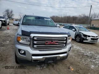 2019 GMC Canyon 4WD SLT with VIN 1GTG6DEN7K1134168, listed as a Copart auction lot 86510834 with 61,889 mi miles and Salvage Title. Bid and sale history available at carsss.com. Image 5.