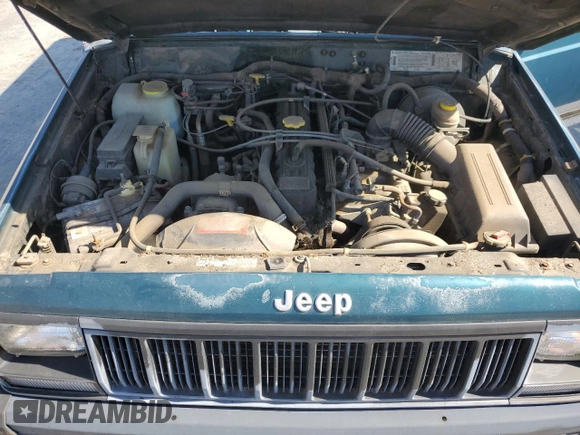 1996 Jeep Cherokee Sport with VIN 1J4FJ68S3TL257912, listed as a Copart auction lot 77109634 with 53,841 mi miles and Clean Title. Bid and sale history available at carsss.com. Image 12.