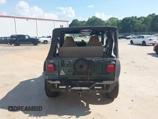 2002 Jeep Wrangler Sport with VIN 1J4FA49S52P760173, listed as a IAAI auction lot 42468550 with 201,682 mi miles and . Bid and sale history available at DreamBid. Image 16.