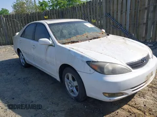 2002 Toyota Camry XLE z VIN JTDBF30K820027492, wystawiony jako IAAI lot #42158162 z przebiegiem 224 291 mil mil oraz . Historia ofert i sprzedaży dostępna na DreamBid. Obrazek 1.