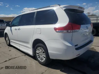 2011 Toyota Sienna XLE AAS with VIN 5TDYK3DC7BS007529, listed as a Copart auction lot 49642475 with 115,117 mi miles and Salvage Title. Bid and sale history available at carsss.com. Image 2.