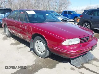 1995 Oldsmobile 88 z VIN 1G3HY52K1SH331973, wystawiony jako IAAI lot #41795311 z przebiegiem 110 407 mil mil oraz . Historia ofert i sprzedaży dostępna na DreamBid. Obrazek 1.