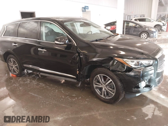2020 Infiniti QX60 Pure with VIN 5N1DL0MN3LC533814, listed as a IAAI auction lot 41077349 with 79,377 mi miles and . Bid and sale history available at DreamBid. Image 1.
