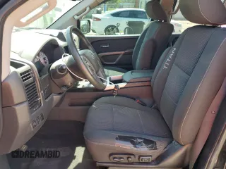 2015 Nissan Titan Pro-4X with VIN 1N6BA0EC1FN507491, listed as a Copart auction lot 51240915 with 165,510 mi miles and Salvage title. Bid and sale history available at DreamBid. Image 7.
