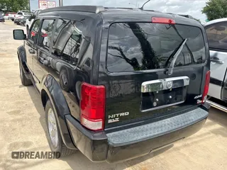 2007 Dodge Nitro SLT z VIN 1D8GU58K77W690568, wystawiony jako Copart lot #61766405 z przebiegiem 177 426 mil mil oraz Czysty tytuł • Clean title. Historia ofert i sprzedaży dostępna na DreamBid. Obrazek 3.