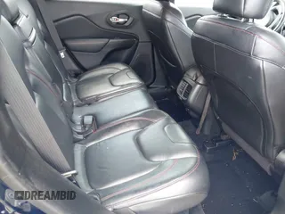2014 Jeep Cherokee Trailhawk с VIN 1C4PJMBS4EW281449, выставлен на аукционе IAAI как лот 42477320 с пробегом 128 107 миль миль и . История ставок и продаж доступна на DreamBid. Изображение 8.