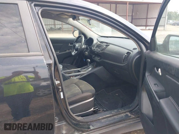 2012 Kia Sportage LX with VIN KNDPB3A28C7337795, listed as a IAAI auction lot 40118771 with 187,037 mi miles and . Bid and sale history available at DreamBid. Image 5.