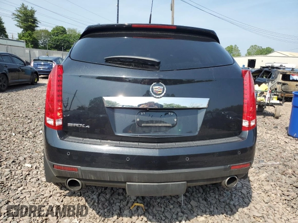 2011 Cadillac SRX Premium Collection z VIN 3GYFNFEY9BS606335, wystawiony jako Copart lot #59009285 z przebiegiem 152 828 mil mil oraz Szkoda całkowita • Salvage title. Historia ofert i sprzedaży dostępna na DreamBid. Obrazek 6.