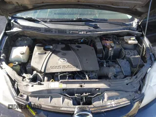 2006 Mazda 5 Sport with VIN JM1CR293560119215, listed as a IAAI auction lot 41774497 with 203,660 mi miles. Bid and sale history available at carsss.com. Image 10.
