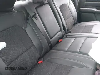2021 Ram 1500 Rebel with VIN 1C6SRFLT0MN734774, listed as a IAAI auction lot 41075676 with 95,808 mi miles and . Bid and sale history available at DreamBid. Image 8.