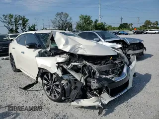 2016 Nissan Maxima SR with VIN 1N4AA6AP5GC421677, listed as a Copart auction lot 58738515 with 140,920 mi miles and Salvage title. Bid and sale history available at DreamBid. Image 14.