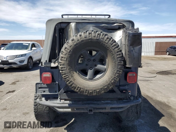 2004 Jeep Wrangler X with VIN 1J4FA39S64P721072, listed as a Copart auction lot 57512865 with Not provided miles and Clean title. Bid and sale history available at DreamBid. Image 6.