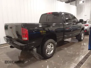 2005 Dodge Ram 3500 SLT with VIN 3D7LS38C85G810265, listed as a IAAI auction lot 41856058 with 164,027 mi miles. Bid and sale history available at carsss.com. Image 4.