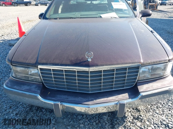 1996 Cadillac Fleetwood z VIN 1G6DW52PXTR713787, wystawiony jako IAAI lot #42079864 z przebiegiem Nie podano mil oraz . Historia ofert i sprzedaży dostępna na DreamBid. Obrazek 10.