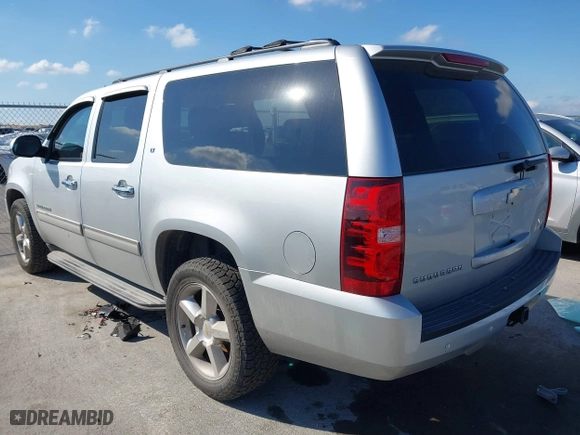 2012 Chevrolet Suburban LT with VIN 1GNSCJE01CR220186, listed as a IAAI auction lot 41476520 with 117,714 mi miles. Bid and sale history available at carsss.com. Image 3.