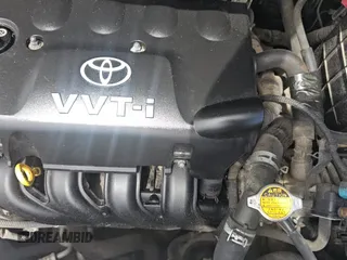 2009 Toyota Yaris z VIN JTDBT903991341371, wystawiony jako Copart lot #57634955 z przebiegiem 205 618 mil mil oraz Czysty tytuł • Clean title. Historia ofert i sprzedaży dostępna na DreamBid. Obrazek 11.