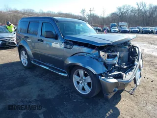 2011 Dodge Nitro Heat with VIN 1D4PU4GX9BW607188, listed as a IAAI auction lot 41100616 with 86,062 mi miles. Bid and sale history available at carsss.com. Image 1.