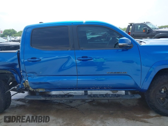 2018 Toyota Tacoma SR5 z VIN 5TFAZ5CN2JX064452, wystawiony jako IAAI lot #41945468 z przebiegiem 132 450 mil mil oraz . Historia ofert i sprzedaży dostępna na DreamBid. Obrazek 13.