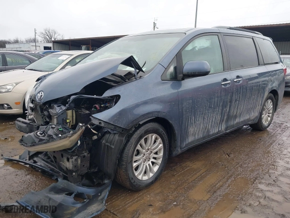 2016 Toyota Sienna XLE with VIN 5TDYK3DC6GS724835, listed as a IAAI auction lot 41477632 with 125,679 mi miles. Bid and sale history available at carsss.com. Image 16.