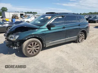 2018 Volkswagen Tiguan SEL с VIN 3VV3B7AX1JM181802, выставлен на аукционе Copart как лот 56845365 с пробегом 144 392 миль миль и Списание • Salvage title. История ставок и продаж доступна на DreamBid. Изображение 1.
