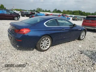 2014 BMW 6 Series z VIN WBALY1C59EDZ73460, wystawiony jako Copart lot #64846204 z przebiegiem 58 876 mil mil oraz Czysty tytuł • Clean title. Historia ofert i sprzedaży dostępna na DreamBid. Obrazek 3.
