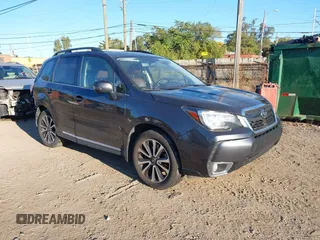 2017 Subaru Forester Touring with VIN JF2SJGTC3HH516646, listed as a IAAI auction lot 40560446 with 85,842 mi miles. Bid and sale history available at carsss.com. Image 1.