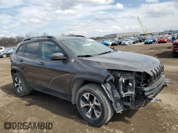 2018 Jeep Cherokee Trailhawk with VIN 1C4PJMBB0JD561309, listed as a Copart auction lot 51487065 with 105,138 mi miles and Salvage title. Bid and sale history available at DreamBid. Image 4.