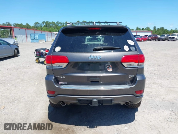 2017 Jeep Grand Cherokee Overland with VIN 1C4RJFCG2HC641791, listed as a IAAI auction lot 42566654 with 116,764 mi miles and . Bid and sale history available at DreamBid. Image 16.
