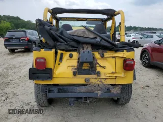 2000 Jeep Wrangler Sport with VIN 1J4FA49SXYP789791, listed as a Copart auction lot 60538875 with Not provided miles and Salvage title. Bid and sale history available at DreamBid. Image 6.