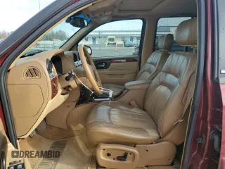 2003 GMC Envoy SLT with VIN 1GKDT13S032245485, listed as a Copart auction lot 84385304 with 139,183 mi miles and Salvage Title. Bid and sale history available at carsss.com. Image 7.