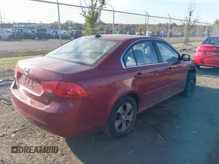2009 Kia Optima LX z VIN KNAGE228995289603, wystawiony jako IAAI lot #40716738 z przebiegiem 209 904 mil mil oraz . Historia ofert i sprzedaży dostępna na DreamBid. Obrazek 4.
