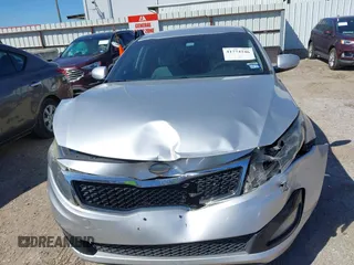 2013 Kia Optima LX z VIN KNAGM4A70D5414844, wystawiony jako IAAI lot #41774246 z przebiegiem 180 332 mil mil oraz . Historia ofert i sprzedaży dostępna na DreamBid. Obrazek 11.