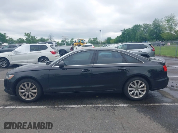 2015 Audi A6 Premium Plus z VIN WAUGFAFC6FN028169, wystawiony jako IAAI lot #42273931 z przebiegiem 100 056 mil mil oraz . Historia ofert i sprzedaży dostępna na DreamBid. Obrazek 14.