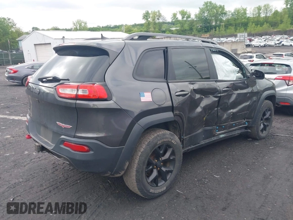 2017 Jeep Cherokee Trailhawk with VIN 1C4PJMBS6HW577058, listed as a IAAI auction lot 42220033 with 111,623 mi miles and . Bid and sale history available at DreamBid. Image 4.
