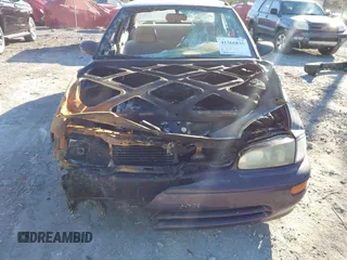 1996 Geo Prizm z VIN 1Y1SK5267TZ023983, wystawiony jako IAAI lot #41366835 z przebiegiem 156 429 mil mil oraz . Historia ofert i sprzedaży dostępna na DreamBid. Obrazek 6.