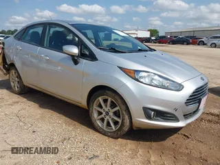 2019 Ford Fiesta SE z VIN 3FADP4BJXKM106665, wystawiony jako IAAI lot #41920371 z przebiegiem 128 257 mil mil oraz . Historia ofert i sprzedaży dostępna na DreamBid. Obrazek 1.