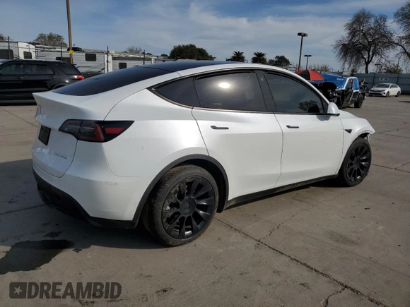 2023 Tesla Model Y Long Range z VIN 7SAYGDEE2PA065048, wystawiony jako Copart lot #48403655 z przebiegiem 56 553 mil mil oraz Szkoda całkowita • Salvage title. Historia ofert i sprzedaży dostępna na DreamBid. Obrazek 3.