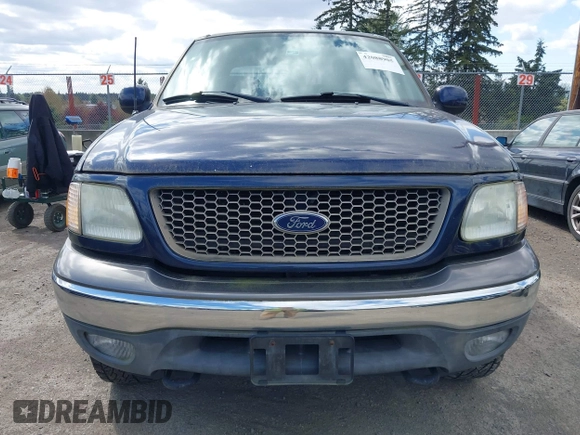 2003 Ford F-150 XLT with VIN 1FTRW08L93KD64270, listed as a IAAI auction lot 42088905 with 181,528 mi miles. Bid and sale history available at carsss.com. Image 12.