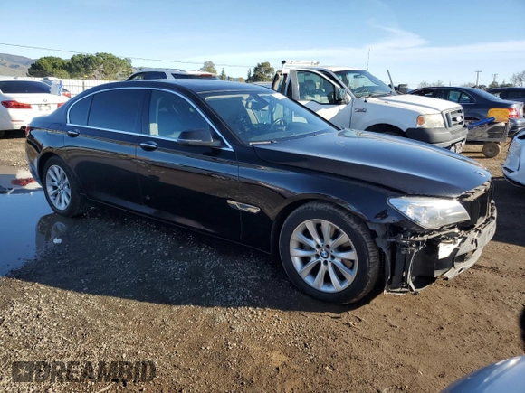 2015 BMW 7 Series 740Li with VIN WBAYE4C55FD947214, listed as a Copart auction lot 87261354 with 393,256 mi miles and Salvage Title. Bid and sale history available at DreamBid. Image 4.