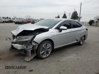 2018 Honda Clarity Touring with VIN JHMZC5F35JC001415, listed as a Copart auction lot 58791035 with 62,985 mi miles and Salvage title. Bid and sale history available at DreamBid. Image 1.