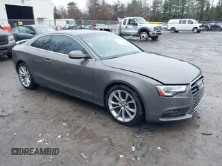 2014 Audi A5 Premium Plus with VIN WAULFAFR4EA008799, listed as a IAAI auction lot 41882950 with 95,326 mi miles and . Bid and sale history available at DreamBid. Image 1.