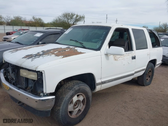 1997 Chevrolet Tahoe with VIN 1GNEK13RXVJ389741, listed as a IAAI auction lot 41518277 with 124,870 mi miles. Bid and sale history available at carsss.com. Image 2.