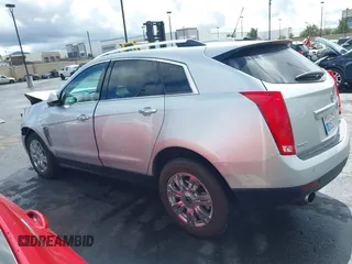 2016 Cadillac SRX Luxury Collection z VIN 3GYFNBE38GS520891, wystawiony jako IAAI lot #41781445 z przebiegiem 52 202 mil mil oraz . Historia ofert i sprzedaży dostępna na DreamBid. Obrazek 15.