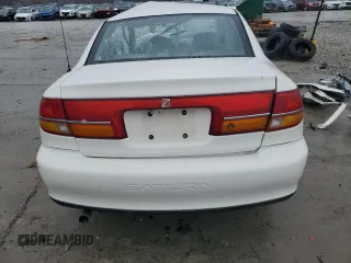 2001 Saturn LS z VIN 1G8JU52F11Y575177, wystawiony jako Copart lot #47739995 z przebiegiem Nie podano mil oraz Szkody całkowita. Historia ofert i sprzedaży dostępna na DreamBid. Obrazek 6.