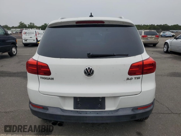 2013 Volkswagen Tiguan SE with VIN WVGAV3AX1DW574009, listed as a Copart auction lot 60936735 with 121,624 mi miles and Clean title. Bid and sale history available at DreamBid. Image 6.