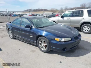 2003 Pontiac Grand Prix GT with VIN 1G2WP52K53F148801, listed as a IAAI auction lot 41888412 with 135,142 mi miles. Bid and sale history available at carsss.com. Image 1.